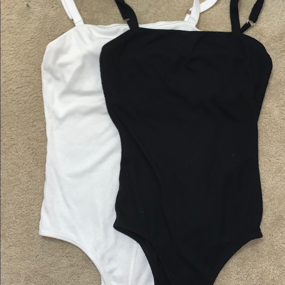 black and white matching body suits